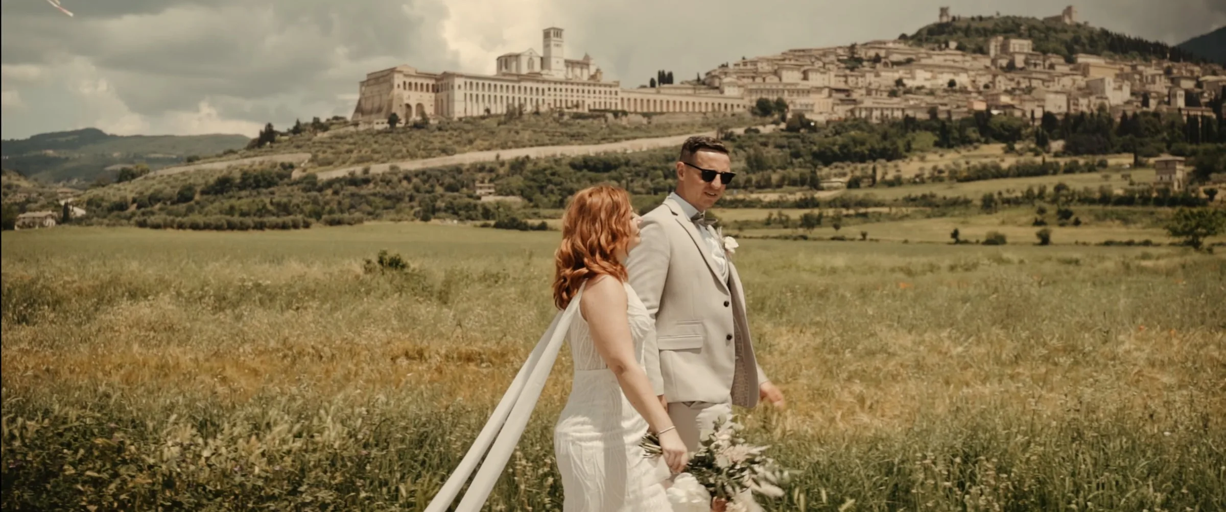 James and Stacey in the countryside near Assisi, from their wedding film at Tenuta di San Masseo