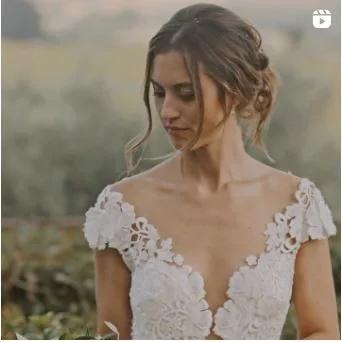 Bride among the olive trees, looking down — Cinemarry Instagram reel